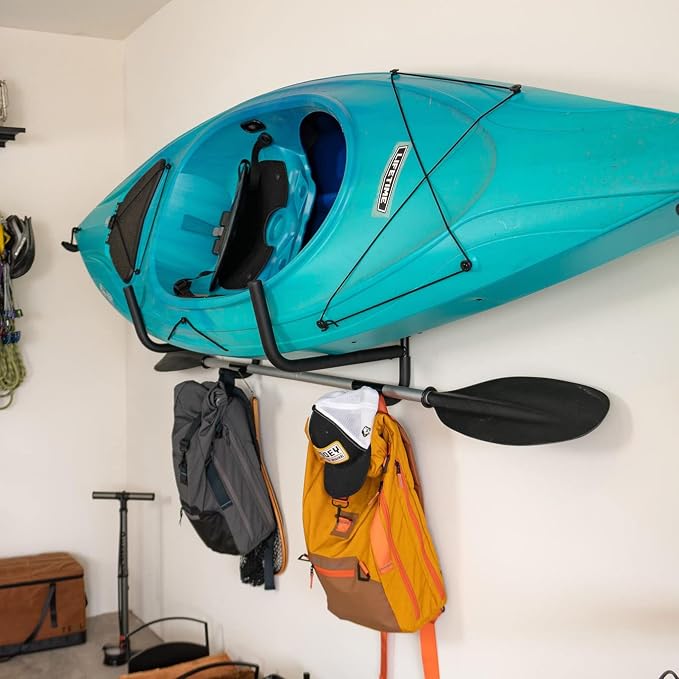 StoreYourBoard Kayak Storage Rack for Garage | Swivel Kayak Wall Mount with Paddle Holder | Indoor Outdoor Folding Kayak Wall Rack for Paddle Board/SUP Storage, Heavy Duty Padded Arms, Holds 100 lbs