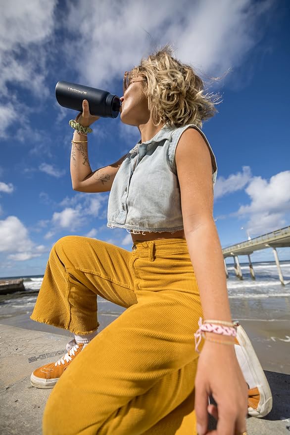 LifeStraw Go Series — Insulated Stainless Steel Water Filter Bottle for Travel and Everyday Use Removes Bacteria, Parasites and Microplastics, Improves Taste, 24 oz, Aegan Sea