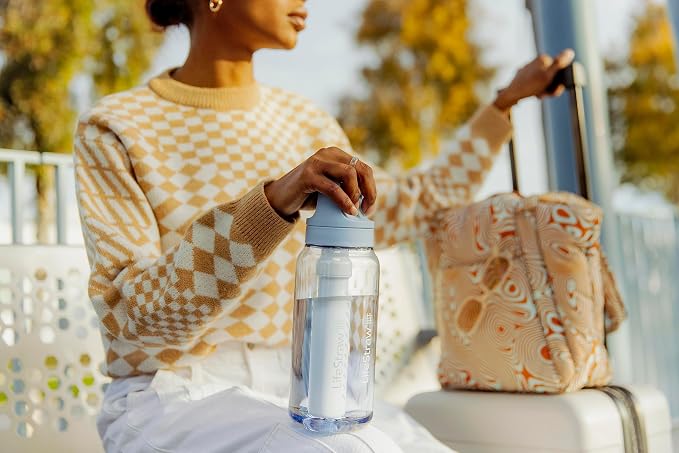 LifeStraw Go Series — BPA-Free Water Filter Bottle for Travel and Everyday Use removes Bacteria, Parasites and Microplastics, Improves Taste, 1L, Icelandic Blue