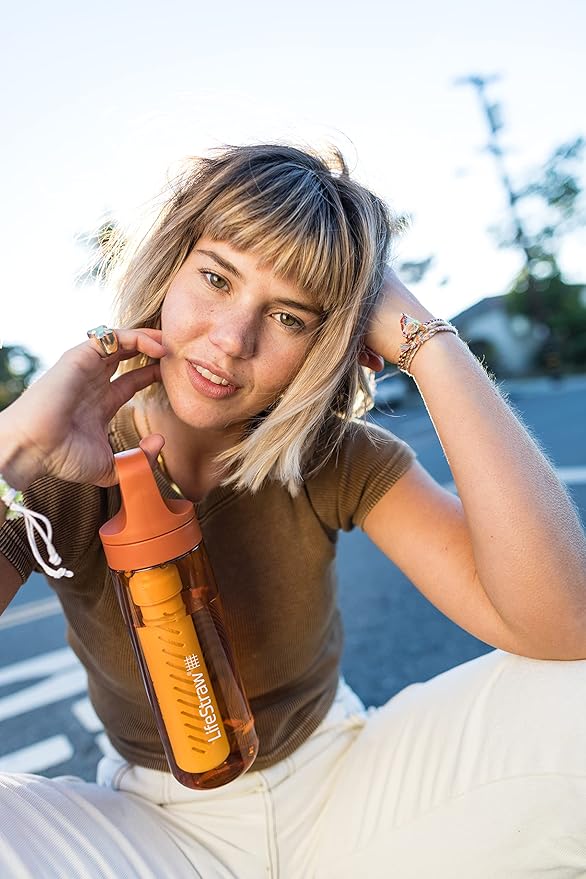 LifeStraw Go Series — BPA-Free Water Filter Bottle for Travel and Everyday Use Removes Bacteria, Parasites and Microplastics, Improves Taste, 22 oz, Kyoto Orange
