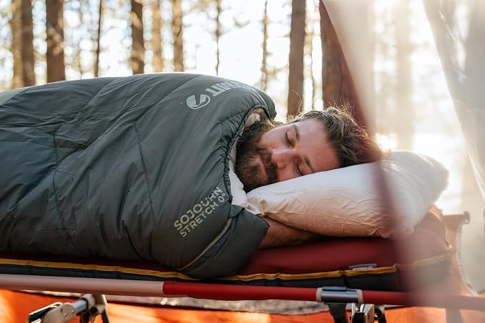 KLYMIT Drift Camping Pillow | Lightweight, Travel Head Rest for Sleep Filled with Shredded Memory Foam, Reversible Outer Cover for Extended Use, Regular Size — Tan