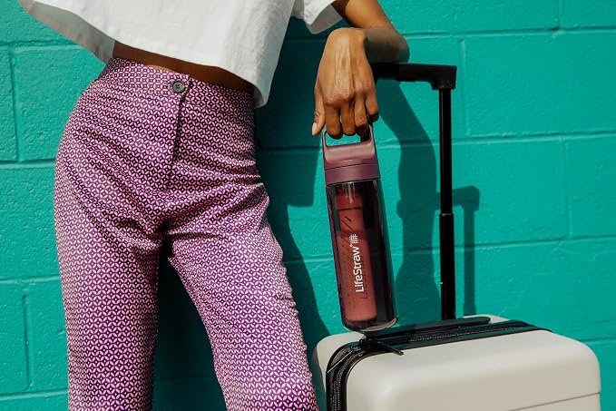 LifeStraw Go Series — BPA-Free Water Filter Bottle for Travel and Everyday Use Removes Bacteria, Parasites and Microplastics, Improves Taste, 22 oz, Merlot Me Away